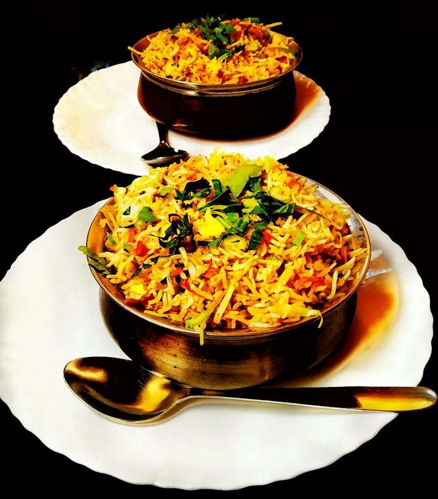 Chicken biryani in a copper pot